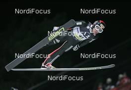 13.12.2007, Villach, Austria (AUT): Simon Ammann (SUI) - FIS world cup ski jumping, individual HS98, Villach (AUT). www.nordicfocus.com. c Furtner/NordicFocus. Every downloaded picture is fee-liable.