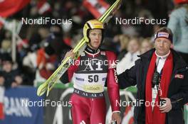 13.12.2007, Villach, Austria (AUT): Andreas Kuettel (SUI), Walter Hofer race director - FIS world cup ski jumping, individual HS98, Villach (AUT). www.nordicfocus.com. c Furtner/NordicFocus. Every downloaded picture is fee-liable.