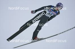 07.12.2008, Trondheim, Norway (NOR): Martin Schmitt (GER), Atomic  - FIS world cup ski jumping, individual HS142, Trondheim (NOR). www.nordicfocus.com. © Furtner/NordicFocus. Every downloaded picture is fee-liable.