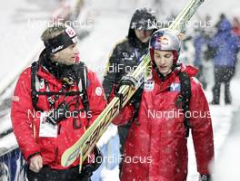 13.02.2009, Oberstdorf, Germany (GER): lr: Florian Kotlaba OeSV, Gregor Schlierenzauer (AUT), Fischer - FIS world cup ski jumping, training, Oberstdorf (GER). www.nordicfocus.com. © Furtner/NordicFocus. Every downloaded picture is fee-liable.