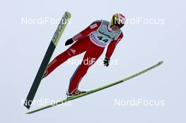 20.12.2009, Engelberg, Switzerland (SUI): Andreas Kuettel (SUI), Fischer, adidas - FIS world cup ski jumping, individual HS137, Engelberg (SUI). www.nordicfocus.com. © Manzoni/NordicFocus. Every downloaded picture is fee-liable.