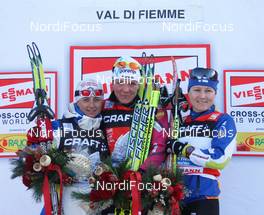 10.01.2010, Val di Fiemme, Italy (ITA): podium TdS sprint ranking, l-r: Arianna Follis (ITA), Fischer, Salomon, Swix, Petra Majdic (SLO), Fischer, Rottefella, Alpina, One Way, Aino Kaisa Saarinen (FIN), Rossignol, Rottefella, One Way  - FIS world cup cross-country, tour de ski, final climb women, Val di Fiemme (ITA). www.nordicfocus.com. © Hemmersbach/NordicFocus. Every downloaded picture is fee-liable.