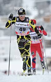 11.12.2010, Davos, Switzerland (SUI): Maurice Manificat (FRA), Fischer, Swix, One Way  - FIS world cup cross-country, 15km men, Davos (SUI). www.nordicfocus.com. Â© Felgenhauer/NordicFocus. Every downloaded picture is fee-liable.