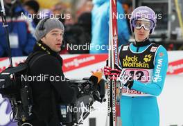 01.01.2010, Garmisch, Germany (GER): Martin Schmitt (GER), Atomic   - FIS world cup ski jumping, four hills tournament, individual HS140, Garmisch (GER). www.nordicfocus.com. © Domanski/NordicFocus. Every downloaded picture is fee-liable.