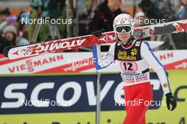 01.01.2010, Garmisch, Germany (GER): Bjoern Einar Romoeren (NOR), Atomic   - FIS world cup ski jumping, four hills tournament, individual HS140, Garmisch (GER). www.nordicfocus.com. © Domanski/NordicFocus. Every downloaded picture is fee-liable.