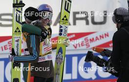 01.01.2010, Garmisch, Germany (GER): l-r: Simon Ammann (SUI), Fischer, adidas, Gregor Schlierenzauer (AUT), Fischer  - FIS world cup ski jumping, four hills tournament, individual HS140, Garmisch (GER). www.nordicfocus.com. © Domanski/NordicFocus. Every downloaded picture is fee-liable.