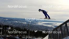 14.03.2010, Holmenkollen, Norway (NOR): an athlete with Oslo in the background - FIS world cup ski jumping, individual HS134, Holmenkollen (NOR). www.nordicfocus.com. © Felgenhauer/NordicFocus. Every downloaded picture is fee-liable.