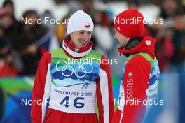 13.02.2010, Whistler, Canada (CAN): group, l-r: Adam Malysz (POL) and Simon Ammann (SUI)  - Olympic Winter Games Vancouver 2010, ski jumping, individual HS106, Whistler (CAN). www.nordicfocus.com. © NordicFocus. Every downloaded picture is fee-liable.