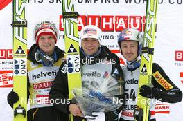 19.12.2010, Engelberg, Switzerland (SUI): (L-R): Thomas Morgenstern (AUT), Fischer, Andreas Kofler (AUT), Fischer, Adam Malysz (POL), Fischer - FIS world cup ski jumping, individual HS137, Engelberg (SUI). www.nordicfocus.com. © Manzoni/NordicFocus. Every downloaded picture is fee-liable.