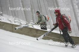 17.12.2010, Engelberg, Switzerland (SUI): Track marshalls try to clean the inrun prior to the qualification - FIS world cup ski jumping, replacing Harrachov, Engelberg (SUI). www.nordicfocus.com. © Manzoni/NordicFocus. Every downloaded picture is fee-liable.