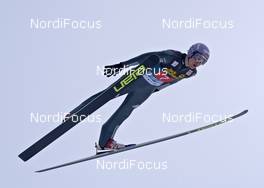 29.12.2010, Oberstdorf, Germany (GER): Martin Schmitt (GER), Elan  - FIS world cup ski jumping, four hills tournament, individual HS137, Oberstdorf (GER). www.nordicfocus.com. Â© Felgenhauer/NordicFocus. Every downloaded picture is fee-liable.