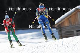 22.01.2011, Antholz, Italy (ITA): Nadezhda Skardino (BLR), Fischer, Rottefella, Jenny Jonsson (SWE), Fischer, Rottefella, Leki, adidas - IBU world cup biathlon, relay women, Antholz (ITA). www.nordicfocus.com. © Manzoni/NordicFocus. Every downloaded picture is fee-liable.