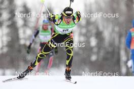 12.02.2011, Fort Kent, United States of America (USA): Jean Guillaume Beatrix (FRA), Rossignol, Rottefella, One Way, Odlo - IBU world cup biathlon, pursuit men, Fort Kent (USA). www.nordicfocus.com. © Manzoni/NordicFocus. Every downloaded picture is fee-liable.