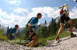 06.07.2011, Ehrwald, Austria (AUT): group of runners on the hill Kreutzeck in Garmisch-Partenkirchen  - Salomon 4 Trails, trail running, 38km, Garmisch-Partenkirchen (GER) - Ehrwald (AUT). www.nordicfocus.com. Â© NordicFocus. Every downloaded picture is fee-liable.