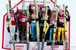 06.02.2011, Oberstdorf, Germany (GER):  the best teams on the podium, (l-r) Norway, Austria and Germany - FIS world cup ski jumping, team HS213, Oberstdorf (GER). www.nordicfocus.com. © Laiho/NordicFocus. Every downloaded picture is fee-liable.
