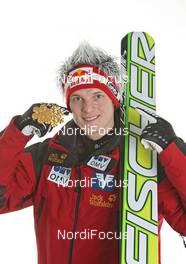 27.02.2011, Oslo, Norway (NOR): Gold Medal Team; Thomas Morgenstern (AUT), Fischer - FIS nordic world ski championships, ski jumping, medals, Oslo (NOR). www.nordicfocus.com. © Hemmersbach/NordicFocus. Every downloaded picture is fee-liable.