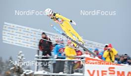 30.12.2011, Oberstdorf, Germany (GER): Maximilian Mechler (GER), fluege.de, passing coaches - FIS world cup ski jumping, four hills tournament, individual HS137, Oberstdorf (GER). www.nordicfocus.com. © Felgenhauer/NordicFocus. Every downloaded picture is fee-liable.
