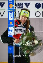 03.12.2011, Lillehammer, Norway (NOR): Sarah Hendrickson (USA), Fluege.de  - FIS world cup ski jumping ladies, individual HS100, Lillehammer (NOR). www.nordicfocus.com. Â© Laiho/NordicFocus. Every downloaded picture is fee-liable.
