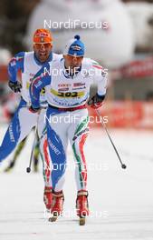 13.03.2011, St. Moritz, Switzerland (SUI): in front 2nd Fabio Santus, (ITA), Fischer, Alpina, Swix, behind 3rd Bruno Carrara (ITA), Skitrab, Rottefella, Alpina - FIS Marathon Cup Engadin Skimarathon, St. Moritz (SUI). www.nordicfocus.com. © Hemmersbach/NordicFocus. Every downloaded picture is fee-liable.