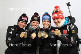 10.03.2012, Ruhpolding, Germany (GER): L-R: Andrea Henkel (GER), Fischer, Rottefella, Swix, adidas, Toko, Miriam Goessner (GER), Fischer, Salomon, Swix, adidas, Magdalena Neuner (GER), Fischer, Rottefella, Swix, adidas, Toko, Tina Bachmann (GER), Fischer, Rottefella, Swix, adidas  - IBU world championships biathlon, medals, Ruhpolding (GER). www.nordicfocus.com. © Manzoni/NordicFocus. Every downloaded picture is fee-liable.