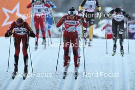 07.01.2012, Val di Fiemme, Italy (ITA): the leading group, in front, l-r: Justyna Kowalczyk (POL), Fischer, Rottefella, Swix and Marit Bjoergen (NOR), Fischer, Rottefella, Swix  - FIS world cup cross-country, tour de ski, mass women, Val di Fiemme (ITA). www.nordicfocus.com. © Hemmersbach/NordicFocus. Every downloaded picture is fee-liable.
