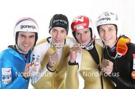 26.02.2012, Vikersund, Norway (NOR): 3rd Team Slovenia, l-r: Jernej Damjan (SLO), Fischer, Jure Sinkovec (SLO), Elan, Robert Kranjec (SLO), Fischer, Jurij Tepes (SLO), Fischer  - FIS world championship ski flying, medals, Vikersund (NOR). www.nordicfocus.com. © Hemmersbach/NordicFocus. Every downloaded picture is fee-liable.