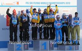 26.02.2012, Vikersund, Norway (NOR): podium, l-r: Team Germany, Team Austria, Team Slovenia - FIS world championship ski flying, team HS225, Vikersund (NOR). www.nordicfocus.com. © Hemmersbach/NordicFocus. Every downloaded picture is fee-liable.