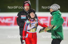 23.11.2012, Lillehammer, Norway (NOR): Anette Sagen (NOR), Fischer  - FIS world cup ski jumping, mixed team HS100, Lillehammer (NOR). www.nordicfocus.com. © Laiho/NordicFocus. Every downloaded picture is fee-liable.