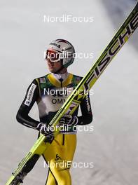 23.11.2012, Lillehammer, Norway (NOR): Simon Ammann (SUI), Fischer  - FIS world cup ski jumping, mixed team HS100, Lillehammer (NOR). www.nordicfocus.com. © Laiho/NordicFocus. Every downloaded picture is fee-liable.
