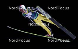 23.11.2012, Lillehammer, Norway (NOR):  Simon Ammann (SUI), Fischer - FIS world cup ski jumping, mixed team HS100, Lillehammer (NOR). www.nordicfocus.com. © Laiho/NordicFocus. Every downloaded picture is fee-liable.
