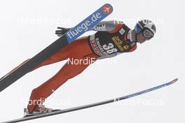 15.12.2012, Engelberg, Switzerland (SUI): Wolfgang Loitzl (AUT), fluege.de  - FIS world cup ski jumping, individual HS137, Engelberg (SUI). www.nordicfocus.com. © Domanski/NordicFocus. Every downloaded picture is fee-liable.
