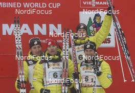 05.01.2013, Schonach, Germany (GER): podium, l-r:  Taylor Fletcher (USA), Atomic, Swix, Bill Demong (USA), Atomic, Swix, Todd Lodwick (USA), Bryan Fletcher (USA), Madshus, Rottefella - FIS world cup nordic combined, team HS106/4x5km, Schonach (GER). www.nordicfocus.com. © Domanski/NordicFocus. Every downloaded picture is fee-liable.
