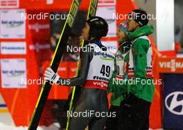 23.02.2013, Val di Fiemme, Italy (ITA): (l-r) Anders Bardal (NOR), Fischer, Tom Hilde (NOR), Fischer and Andreas Stjernen (NOR), Fischer waiting for the results  - FIS nordic world ski championships, ski jumping, individual HS106, Val di Fiemme (ITA). www.nordicfocus.com. © Laiho/NordicFocus. Every downloaded picture is fee-liable.