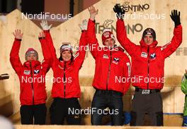 24.02.2013, Val di Fiemme, Italy (ITA):  (l-r) Chiara Hoelzl (AUT), Jacqueline Seifriedsberger (AUT), Fischer, Thomas Morgenstern (AUT), Fischer and Gregor Schlierenzauer (AUT), Fischer - FIS nordic world ski championships, ski jumping, mixed team HS106, Val di Fiemme (ITA). www.nordicfocus.com. © Laiho/NordicFocus. Every downloaded picture is fee-liable.