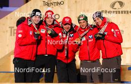 02.03.2013, Val di Fiemme, Italy (ITA): (l-r) Wolfgang Loitzl (AUT), Fluege.de, Thomas Morgenstern (AUT), Fischer, Alexander Pointner (AUT), the coach of team Austria, Manuel Fettner (AUT), Fluege.de and Gregor Schlierenzauer (AUT), Fischer - FIS nordic world ski championships, ski jumping, team HS134, Val di Fiemme (ITA). www.nordicfocus.com. © Laiho/NordicFocus. Every downloaded picture is fee-liable.