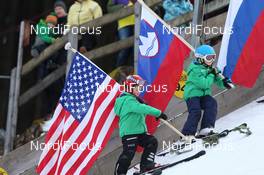 22.12.2013, Engelberg, Switzerland (SUI): Event Feature: Kidz with flags - FIS world cup ski jumping, individual HS137, Engelberg (SUI). www.nordicfocus.com. © Manzoni/NordicFocus. Every downloaded picture is fee-liable.