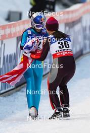 22.02.2013, Val di Fiemme, Italy (ITA):  (l-r) Sarah Hendrickson (USA), Fluege.de and Lindsey Van (USA), Fluege.de - FIS nordic world ski championships, ski jumping ladies, individual HS106, Val di Fiemme (ITA). www.nordicfocus.com. © Laiho/NordicFocus. Every downloaded picture is fee-liable.