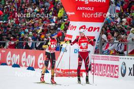 19.01.2014, Antholz, Italy (ITA): Andreas Birnbacher  (GER), Henrik l'Abee-Lund (NOR) - IBU world cup biathlon, relay men, Antholz (ITA). www.nordicfocus.com. © Manzoni/NordicFocus. Every downloaded picture is fee-liable.