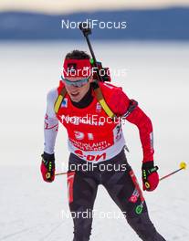 13.03.2014, Kontiolahti, Finland (FIN): Nathan Smith (CAN), Fischer, Rottefella, Leki - IBU world cup biathlon, sprint men, Kontiolahti (FIN). www.nordicfocus.com. © Laiho/NordicFocus. Every downloaded picture is fee-liable.