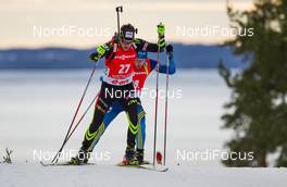 13.03.2014, Kontiolahti, Finland (FIN): Simon Desthieux (FRA), Fischer, Rottefella, Swix, OneWay followed by Fredrik Lindstroem (SWE), Fischer, Rottefella, Swix, adidas - IBU world cup biathlon, sprint men, Kontiolahti (FIN). www.nordicfocus.com. © Laiho/NordicFocus. Every downloaded picture is fee-liable.