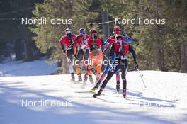 20.12.2014, Pokljuka, Slovenia (SLO): Simon Eder (AUT) leads a group on the track - IBU world cup biathlon, pursuit men, Pokljuka (SLO). www.nordicfocus.com. © Manzoni/NordicFocus. Every downloaded picture is fee-liable.