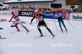 14.12.2014, Davos, Switzerland (SUI): Quarterfinal: Maciej Starega (POL), Roman Schaad (SUI), Gleb Retivykh (RUS), (l-r) - FIS world cup cross-country, individual sprint, Davos (SUI). www.nordicfocus.com. © Rauschendorfer/NordicFocus. Every downloaded picture is fee-liable.