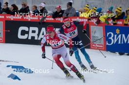 14.12.2014, Davos, Switzerland (SUI): Maciej Starega (POL), Gleb Retivykh (RUS), (l-r) - FIS world cup cross-country, individual sprint, Davos (SUI). www.nordicfocus.com. © Rauschendorfer/NordicFocus. Every downloaded picture is fee-liable.