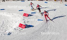 21.12.2014, Davos, Switzerland (SUI): Ingvild Flugstad Oestberg (NOR), Madshus, Swix, Rottefella followed by Sophie Caldwell (USA), Fischer, Swix and Charlotte Kalla (SWE), Fischer, One Way, Alpina, Rottefella, Craft - FIS world cup cross-country, individual sprint, Davos (SUI). www.nordicfocus.com. © Laiho/NordicFocus. Every downloaded picture is fee-liable.