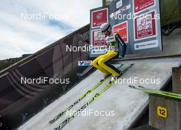 03.01.2014, Innsbruck, Austria (AUT): Simon Ammann (SUI), Fischer - FIS world cup ski jumping, four hills tournament, individual HS130 qualification, Innsbruck (AUT). www.nordicfocus.com. © Laiho/NordicFocus. Every downloaded picture is fee-liable.