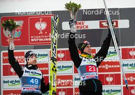 04.01.2014, Innsbruck, Austria (AUT): (l-r) Simon Ammann (SUI), Fischer and Anssi Koivuranta (FIN), Fluege.de - FIS world cup ski jumping, four hills tournament, individual HS130, Innsbruck (AUT). www.nordicfocus.com. © Laiho/NordicFocus. Every downloaded picture is fee-liable.