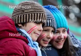 03.01.2014, Innsbruck, Austria (AUT): young fans - FIS world cup ski jumping, four hills tournament, individual HS130 qualification, Innsbruck (AUT). www.nordicfocus.com. © Laiho/NordicFocus. Every downloaded picture is fee-liable.