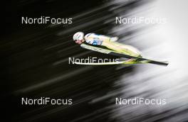 04.01.2014, Innsbruck, Austria (AUT): Stefan Kraft (AUT), Fischer - FIS world cup ski jumping, four hills tournament, individual HS130, Innsbruck (AUT). www.nordicfocus.com. © Laiho/NordicFocus. Every downloaded picture is fee-liable.