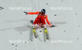 15.02.2014, Sochi, Russia (RUS): Dimitry Vassiliev (RUS), Fischer - XXII. Olympic Winter Games Sochi 2014, ski jumping, individual HS140, Sochi (RUS). www.nordicfocus.com. © NordicFocus. Every downloaded picture is fee-liable.