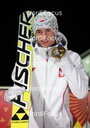 09.02.2014, Sochi, Russia (RUS): Kamil Stoch (POL), Fischer - XXII. Olympic Winter Games Sochi 2014, ski jumping, medals, Sochi (RUS). www.nordicfocus.com. © NordicFocus. Every downloaded picture is fee-liable.